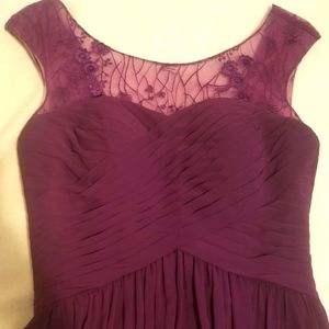 Cap sleeve, tea length plum colour gown